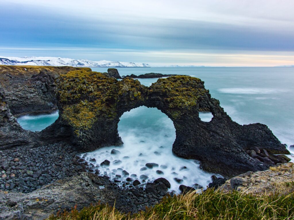 Photo of the ocean with outstanding rock formations in Iceland